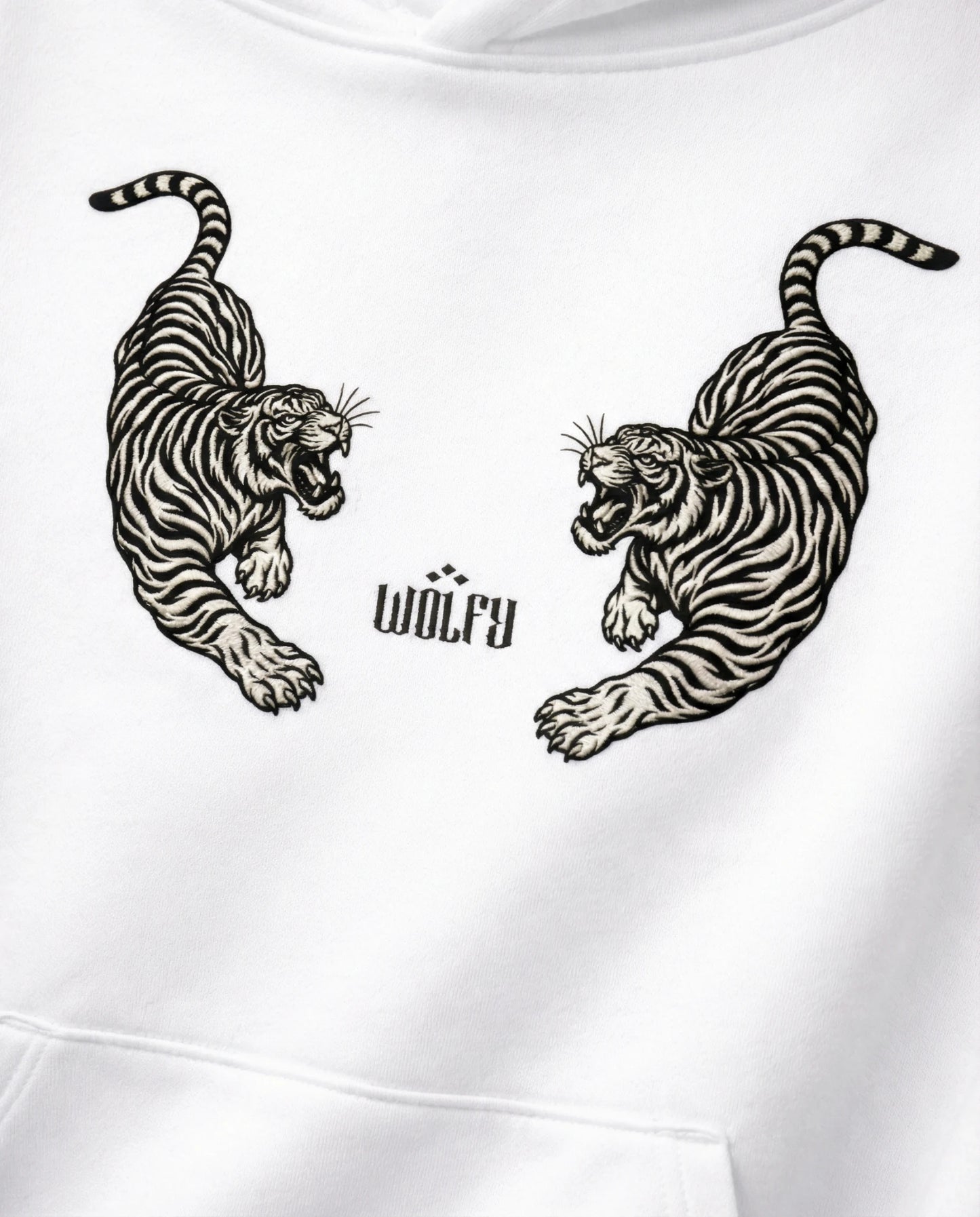 Twin tiger artwork detail on white hoodie