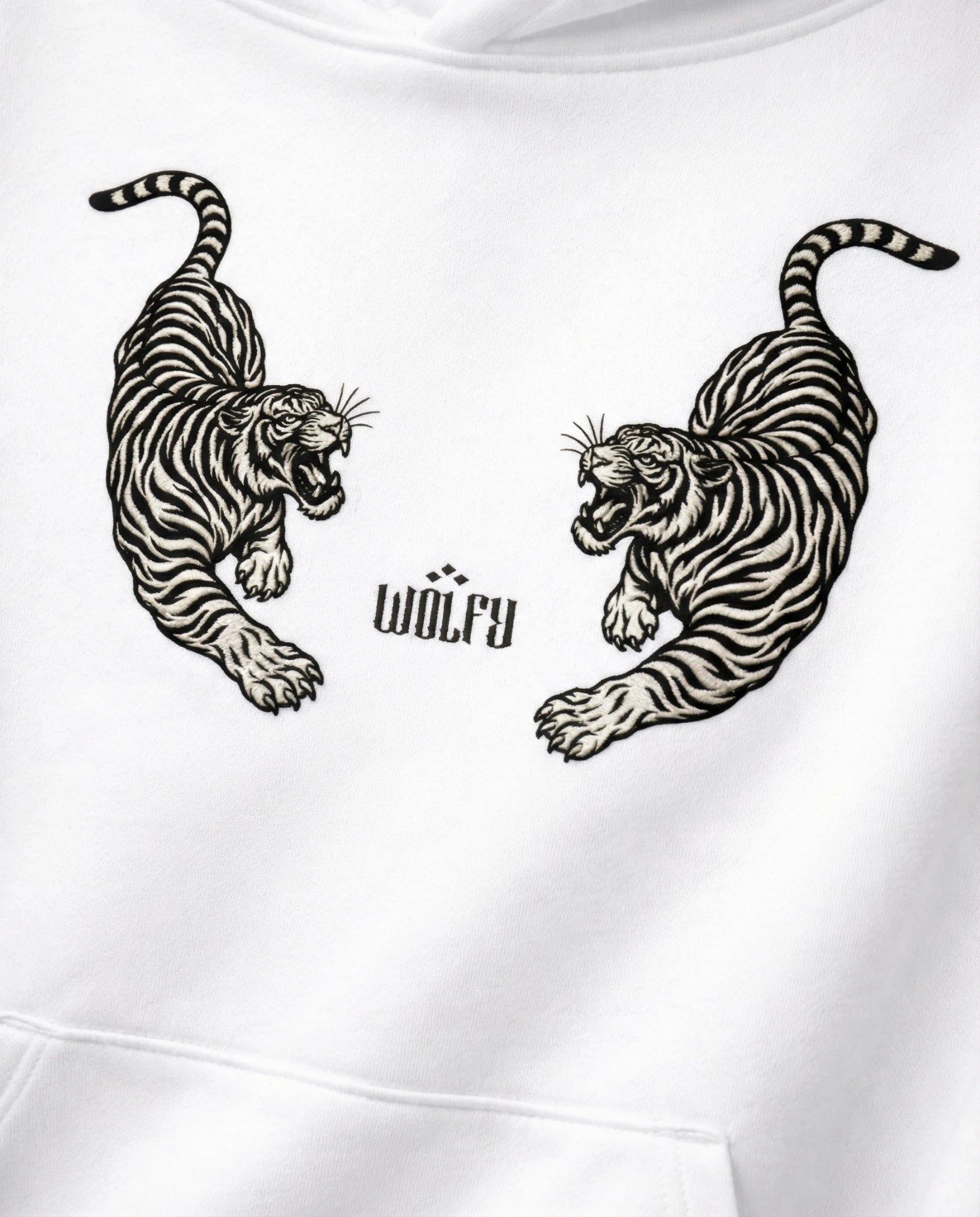 Twin tiger artwork detail on white hoodie